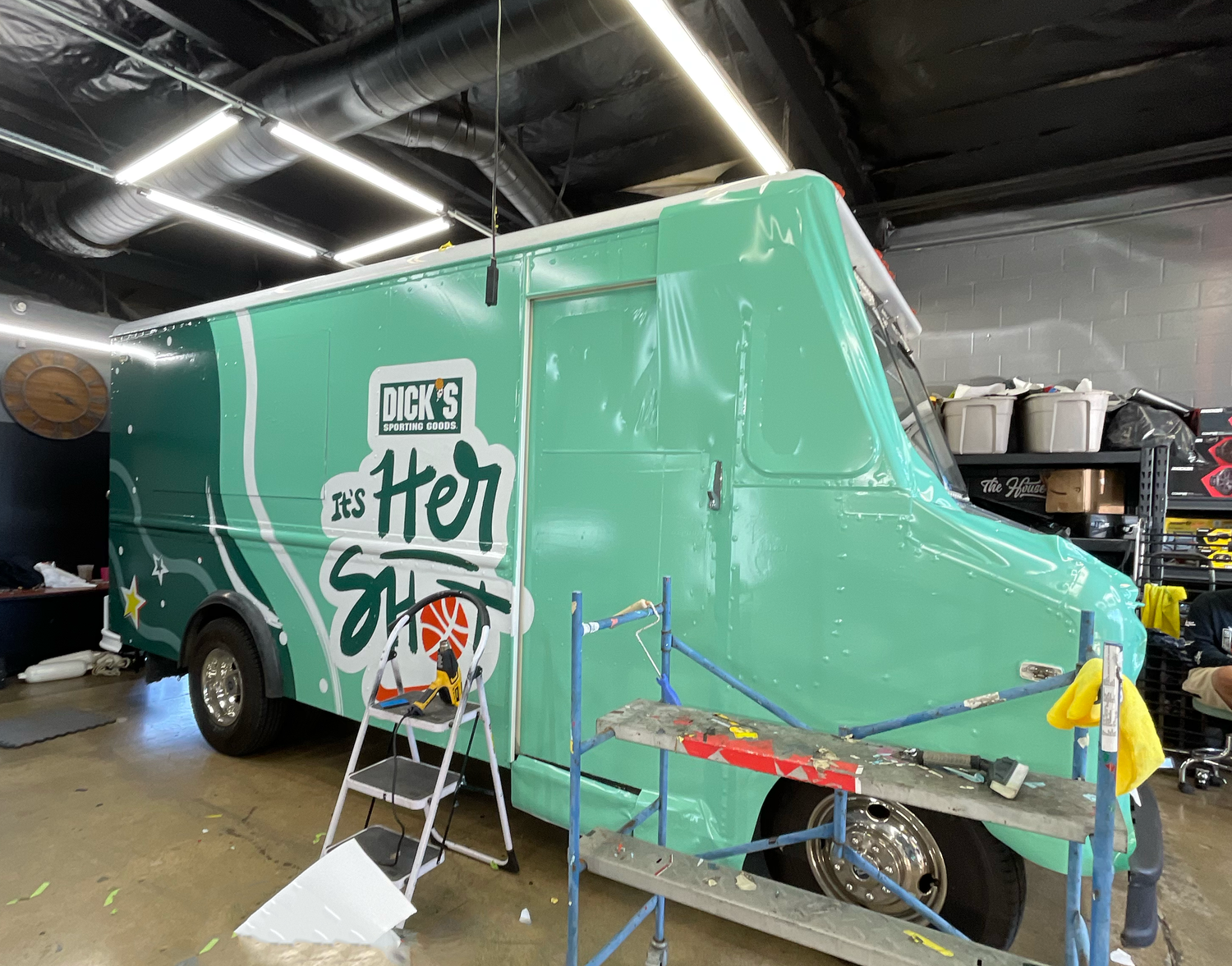 A picture of a experiential marketing vehicle truck that is being wrapped for a advertising campaign in los angeles, california.