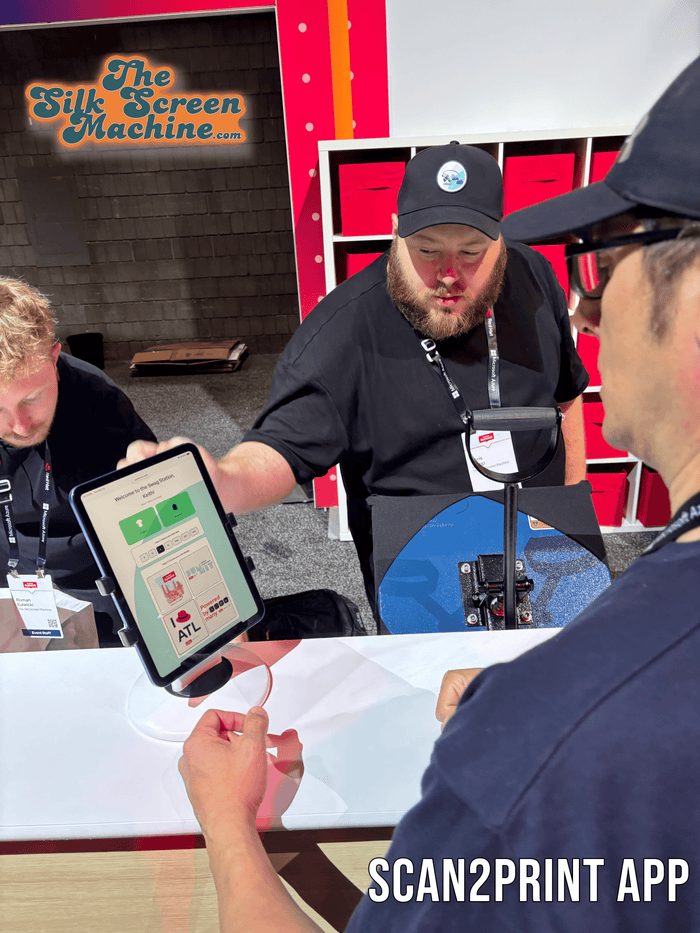 A guest designing a T-shirt on their phone in a branded drag and drop builder app