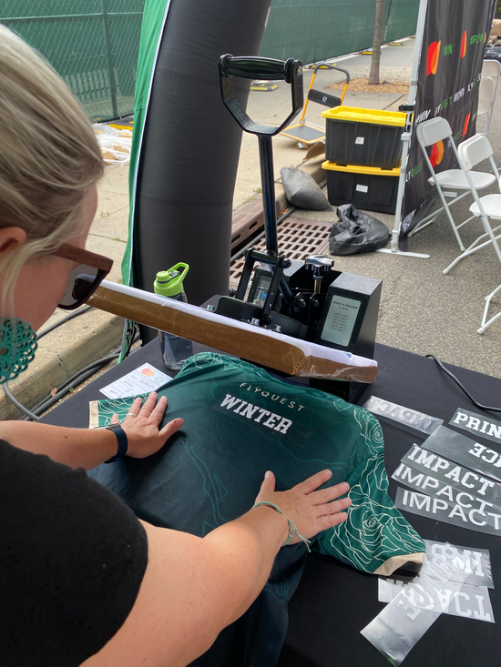 Live screen printing event with customized jersey t-shirts for an activation for a gaming event in Seattle, Washington.