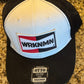 Black and white cap with WRKNMN logo on a granite surface